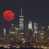 Saturday night's moonrise over lower Manhattan in New York City 