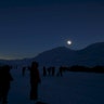 People look at a total solar eclipse on Svalbard, Norway, March 20, 2015