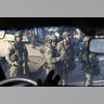 American army personnel gather at the University of Mosul during a battle with Islamic State militants in Mosul, Iraq, January 18, 2017