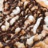 The S'mores Pizza comes covered in chocolate and powdered sugar.