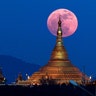 The moon rises behind the Uppatasanti Pagoda seen in Naypyitaw, Myanmar, December 3