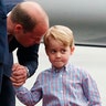 Britain's Prince William, holds the hand of his son Prince George on their arrival at the airport, in Warsaw, Poland, July 17, 2017