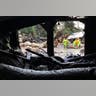 Emergency personnel search through debris and damaged homes after a mudslide in Montecito, January 9, 2018