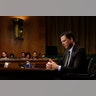 Then-FBI Director James Comey  pauses as he testifies on Capitol Hill in Washington, May 3, 2017