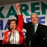 Republican candidate for Georgia's 6th District Congressional seat Karen Handel celebrates with her husband Steve as she declares victory