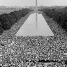 People watch Dr. Martin Luther King, Jr. deliver his 