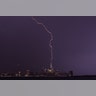 A single bolt of lightning strikes One World Trade Center