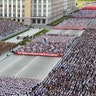 Tens of thousands rally at at Kim Il Sung Square in Pyongyang, August 9