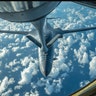 A U.S. Air Force B-1B Lancer receives fuel from a KC-135 Stratotanker during a 10-hour training mission over the Korean Peninsula