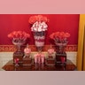 Christmas decor adorns the Red Room of the White House.