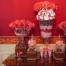 Christmas decor adorns the Red Room of the White House.