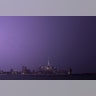 Lightning illuminates the skies over lower Manhattan in New York City Tuesday night