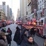 Police and fire crews block off the streets near the New York Port Authority Bus Terminal in New York City, Monday