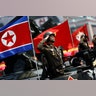 A soldier salutes from atop an armored vehicle during a military parade in Pyongyang April 15, 2017