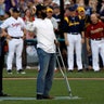 Special Agent David Bailey of the U.S. Capitol Police, wounded in Wednesday's attack with Joe Torre, as he throws out the first pitch