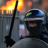 UK_riots_female_cop_AP