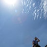Julio Ruiz of J.R.R. Roofing pauses in the heat as the temperature approaches 115-degrees in Tucson, Tuesday
