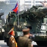 Missiles are driven past the stand with North Korean leader Kim Jong Un during a military parade in Pyongyang, April 15, 2017