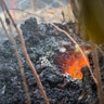 Lava glows from a vent on a lava bed at the Leilani Estates, in Pahoa, Hawaii, May 5, 2018