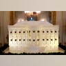 A gingerbread White House is seen on display in the State Dining Room of the White House.