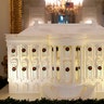 A gingerbread White House is seen on display in the State Dining Room of the White House.