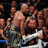 Floyd Mayweather Jr. celebrates after defeating Conor McGregor in a super welterweight boxing match Saturday in Las Vegas