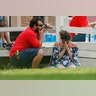 A woman prays following a shooting at Santa Fe High School, in Santa Fe, Texas, May 18, 2018