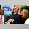 Al Roker laughs as Meredith Vieira smears frosting on co-host Matt Lauer during her first day on NBC's 'Today' show September 13, 2006