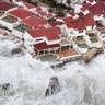 Waves crash into homes caused by Hurricane Irma in St. Maarten, Wednesday