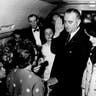 Lyndon Johnson is sworn in as US President in cabin of Air Force One after John F. Kennedy assassination, with Jacqueline Kennedy at right, on Nov. 22, 1963