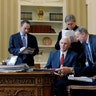 President Donald Trump is joined by Reince Priebus, Vice President Mike Pence, Steve Bannon, Sean Spicer and Mike Flynn in the Oval Office