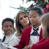 First lady Melania Trump visits with children in the East Wing on Monday.