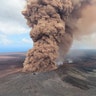 A reddish-brown ash plume rises after a magnitude 6.9 south flank of Kīlauea earthquake shook the Big Island of Hawaii, May 4, 2018