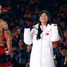 Pita Taufatofua of Tonga and Liu Jiayu of China during the closing ceremony for the Pyeongchang 2018 Winter Olympics