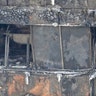 Part of the scorched facade of the Grenfell Tower in London, Thursday