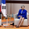 President Donald Trump and Britain's Prime Minister Theresa May attend the 