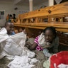 Kids play at a shelter in a local church during the evening before the arrival of Hurricane Irma in Las Terrenas, Dominican Republic, Wednesday