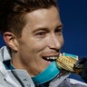 Gold medalist Shaun White of the United States during the victory ceremony for men's halfpipe at the 2018 Winter Olympics