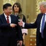 President Donald Trump and China's President Xi Jinping arrive at a state dinner at the Great Hall of the People in Beijing, China, Thursday