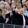 President Donald Trump waves after delivering his inaugural address after being sworn in as the 45th president of the United States during the 58th Presidential Inauguration.