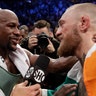 Floyd Mayweather Jr., with Conor McGregor after their super welterweight boxing match Saturday in Las Vegas