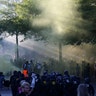German riot police use water cannons on protesters during demonstrations at the G-20 summit in Hamburg, July 6