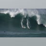 Surfers Take On Giant 30-Foot Waves in Hawaii