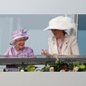 Britain's Queen Elizabeth and Britain's Princess Michael of Kent talk at the Epsom Derby Festival in Epsom, England, June 7, 2014