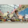 Anna Koh selects a snack while sheltering at Gallery Furniture Wednesday, in Richmond, Texas