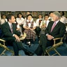 President Bill Clinton chats with NBC-TV host Matt Lauer at the Joseph Lanzetta School in East Harlem, NY, June 16, 2000
