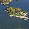 140 Wallacks Dr Stamford, CT. For Sale: $18,900,000. Forget the freeway commute to Manhattan; how about a boat ride from a private island in Long Island Sound? Built in 1909, the 14,000+-square-foot home sits on a 3.5-acre island; and includes a guest cottage, staff quarters and working greenhouse. Explore the private piece of Stamford real estate with terraces, gardens and stone seawalls throughout the property. Just like its mainland counterpart, living on a private island near New York is pricey; even with low mortgage rates, this home has an estimated monthly payment of nearly a $100,000.