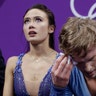 Madison Chock and Evan Bates of the United States  following their performance in the ice dance, free dance figure skating final 