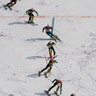 Multiple exposure photo shows gold medalist Andre Myhrer of Sweden winning the men's slalom at the 2018 Winter Olympics