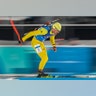 Fredrik Lindstroem of Sweden, skis to a gold medal in the men's 4x7.5-kilometer biathlon relay at the 2018 Winter Olympics